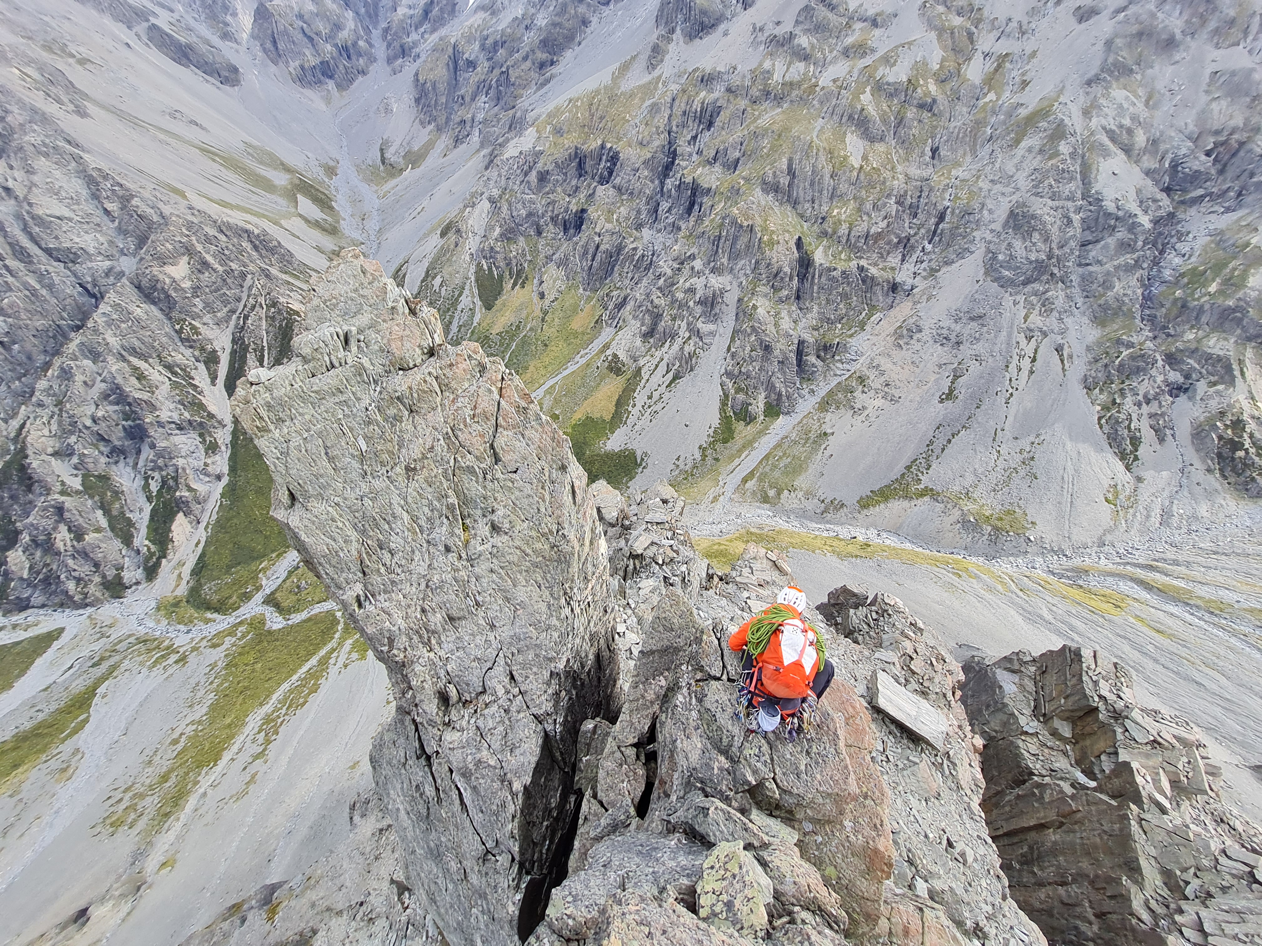 Crossing 'Actions Speak Louder' rib/towers to walkoff. Afterthought is on the right wall of the square-cut gully visible right frame