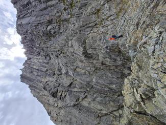 Mid height terrace. Scrambling up and left leads to further pitches in the towers towards left skyline