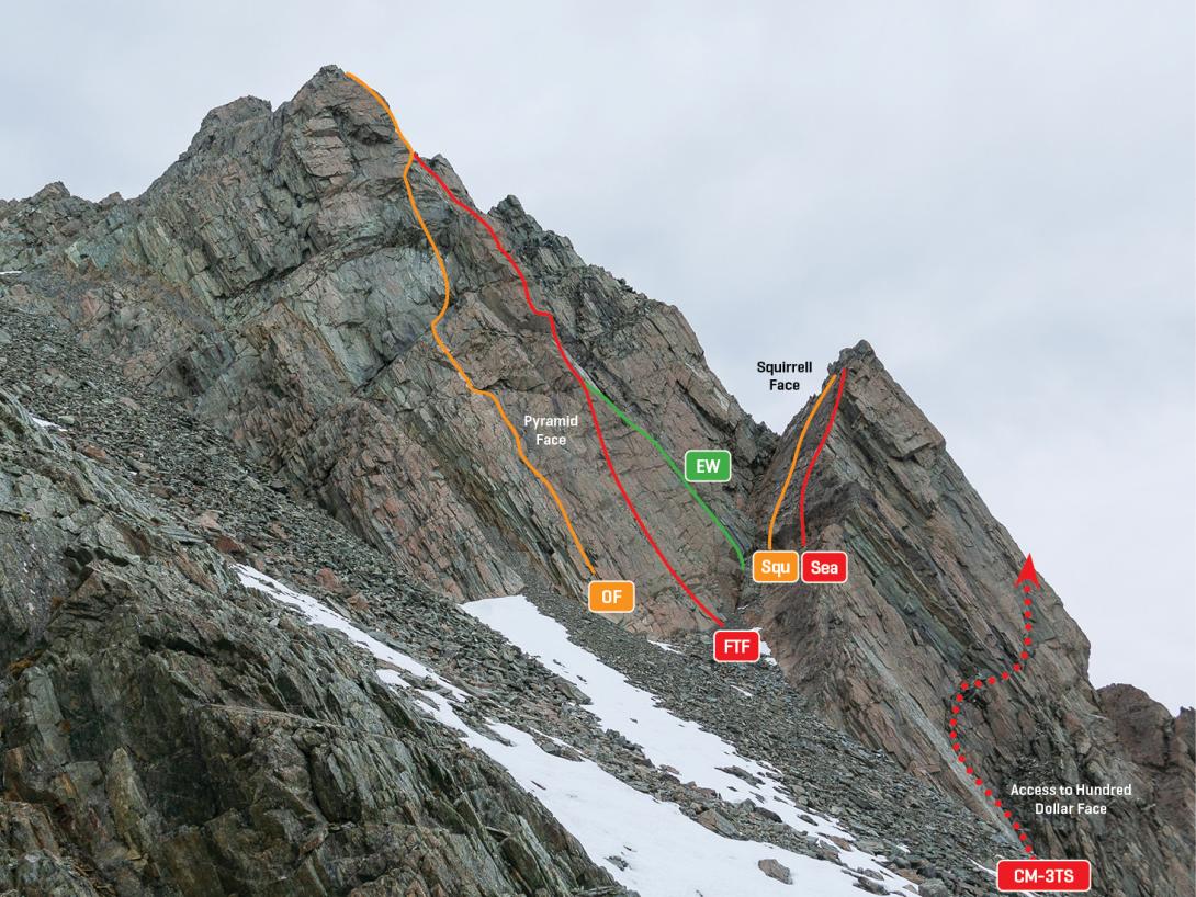 Mountain face with routes marked